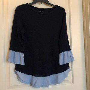Navy blouse with circular flounce sleeves